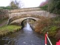 This turnaround bridge is interesting as it is really two bridges combined. The higher section behind the high wall carries a road across the canal whilst the nearer section is the horse route crossing the canal. - Location: Brdige 43 - Canal: Macclesfield